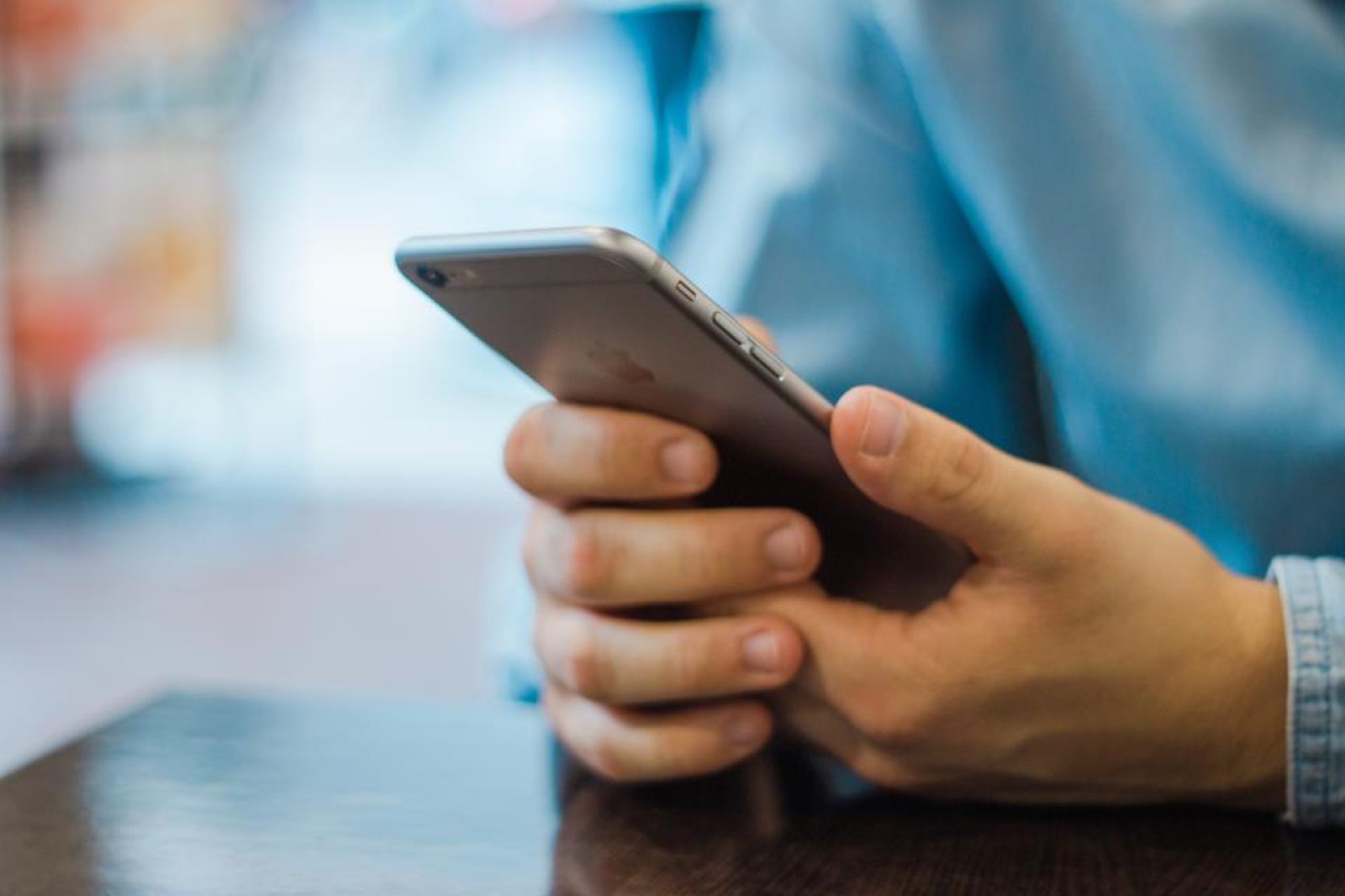 Hands holding a smartphone